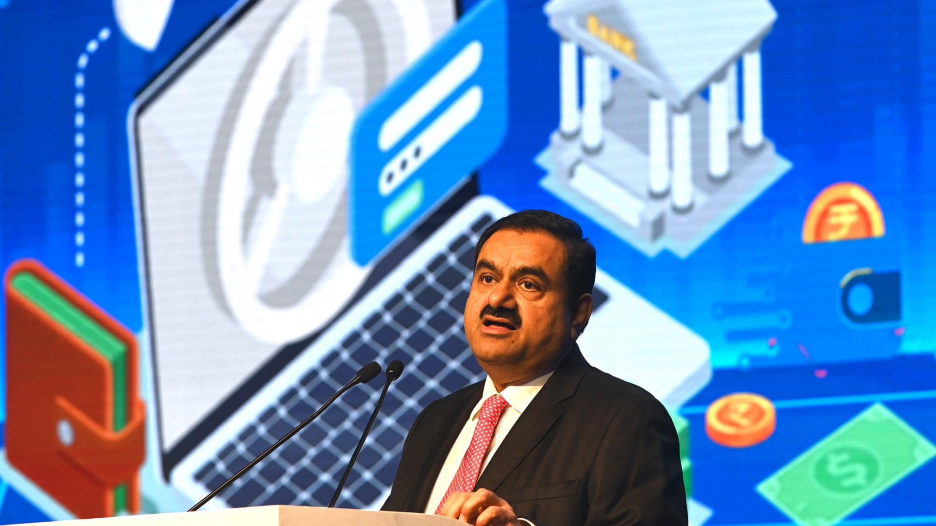 Image for the title: India's Adani empire loses more than $100 bn after fraud claims 