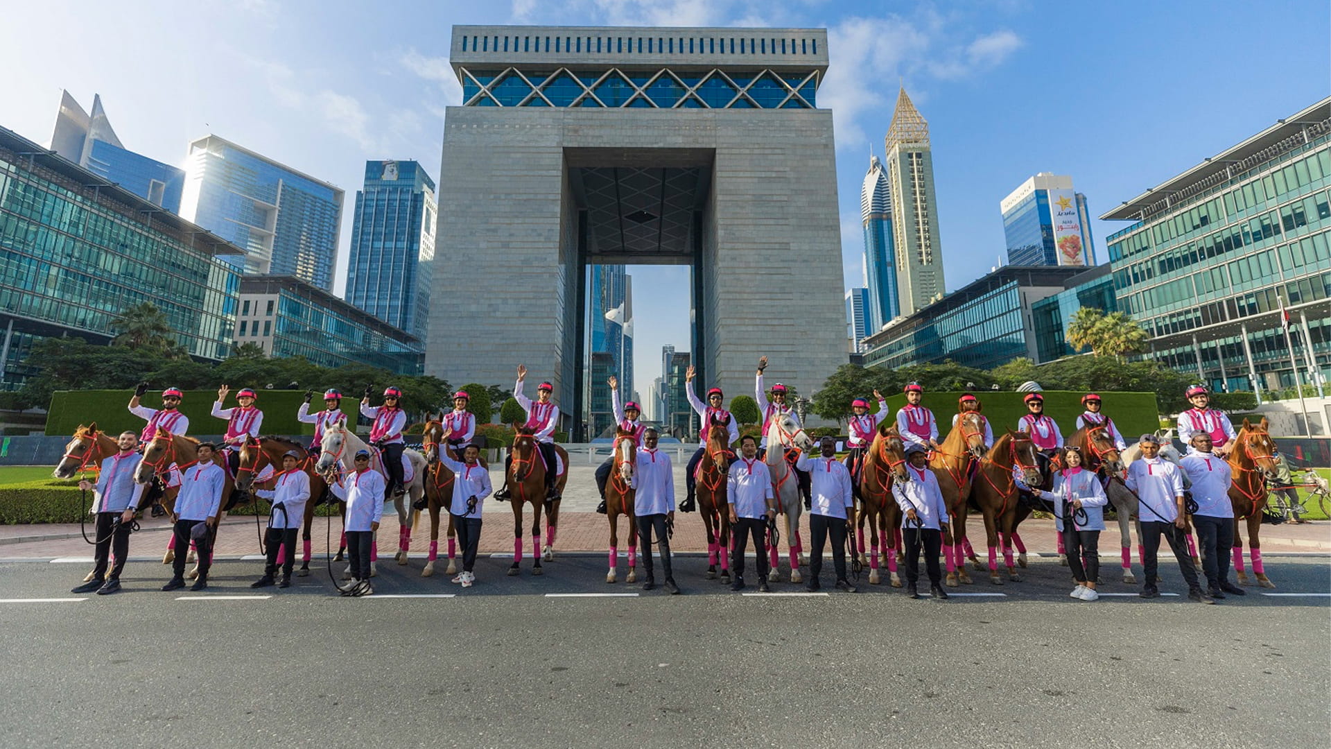 Image for the title: Pink Caravan equestrian brigade strides through Dubai streets  