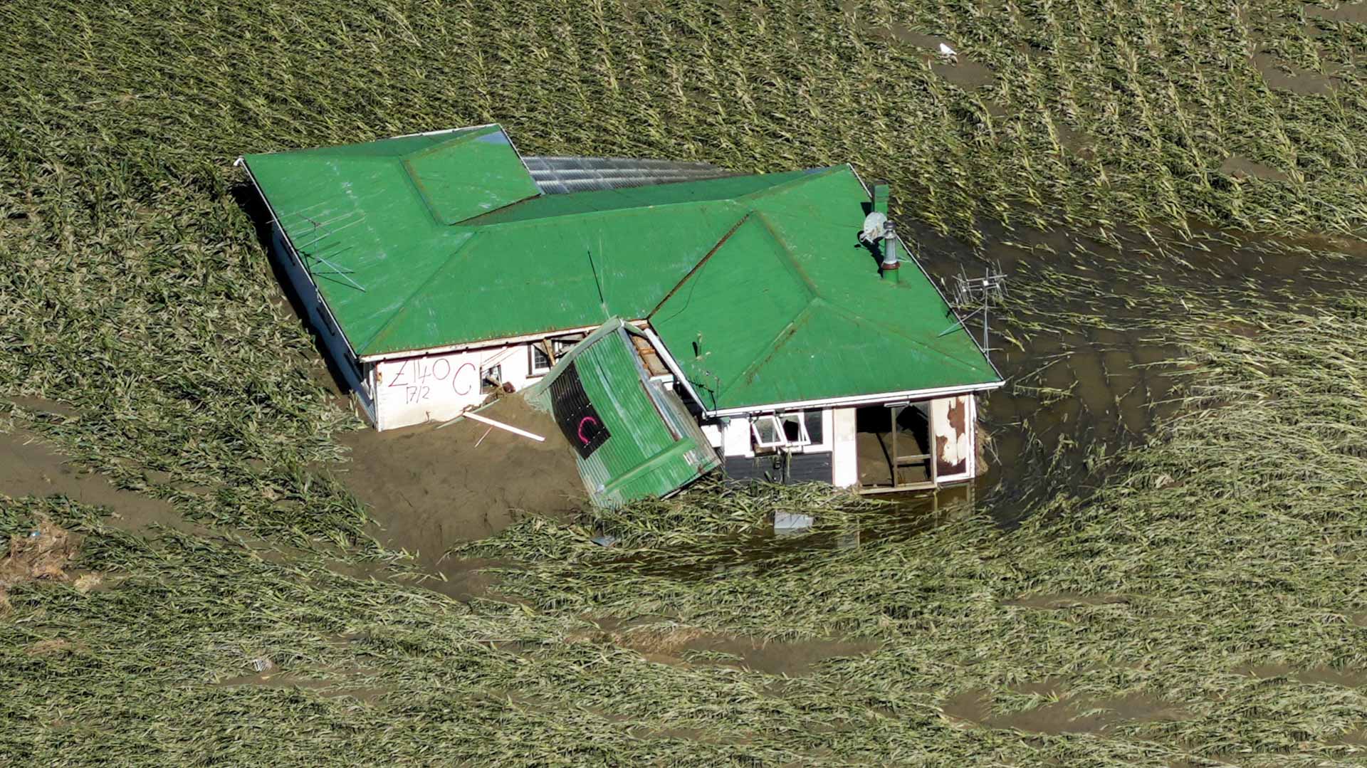Image for the title: Disasters lower outlook for New Zealand interest rate rise 