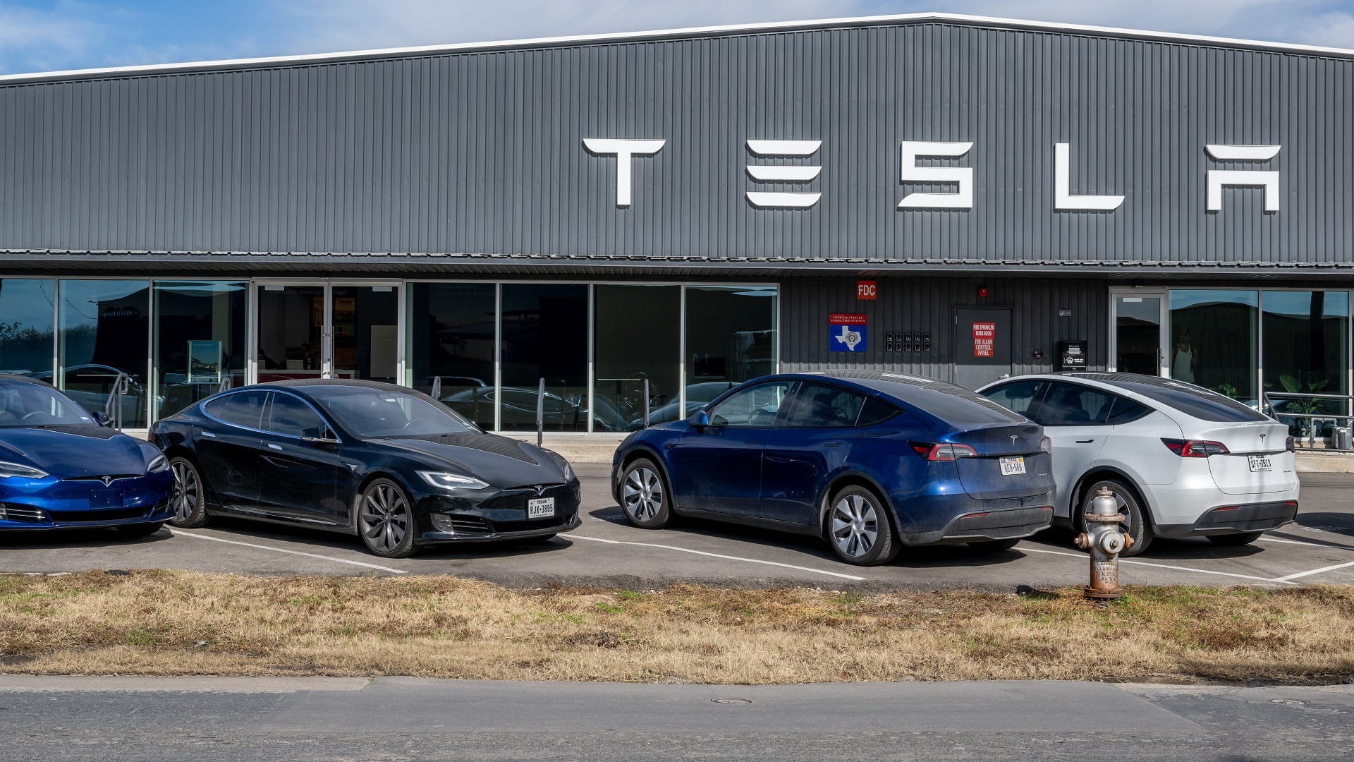 Image for the title: Tesla slashes vehicle prices up to 20% in US, Europe 