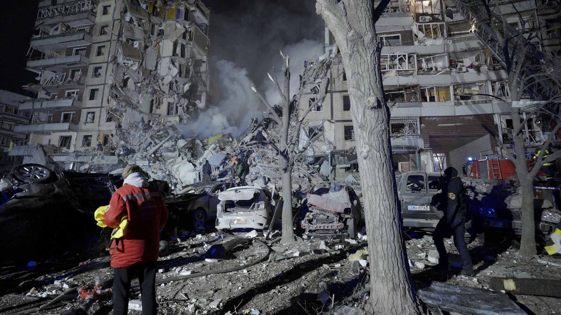 Image for the title: Ukraine says key infrastructure hit, 14 killed in Russian strikes 