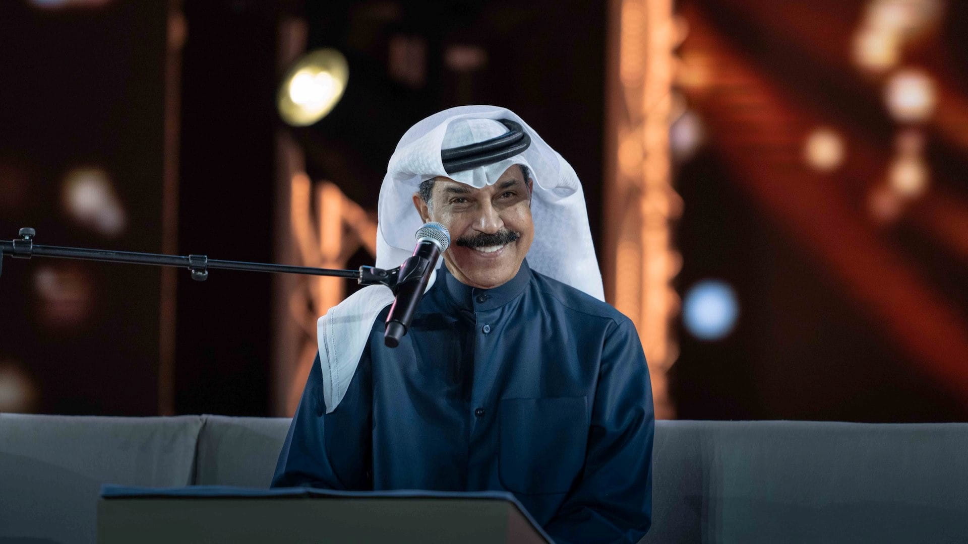 Image for the title: Ruwaished sings his tuneful songs at Khorfakkan Amphitheater 