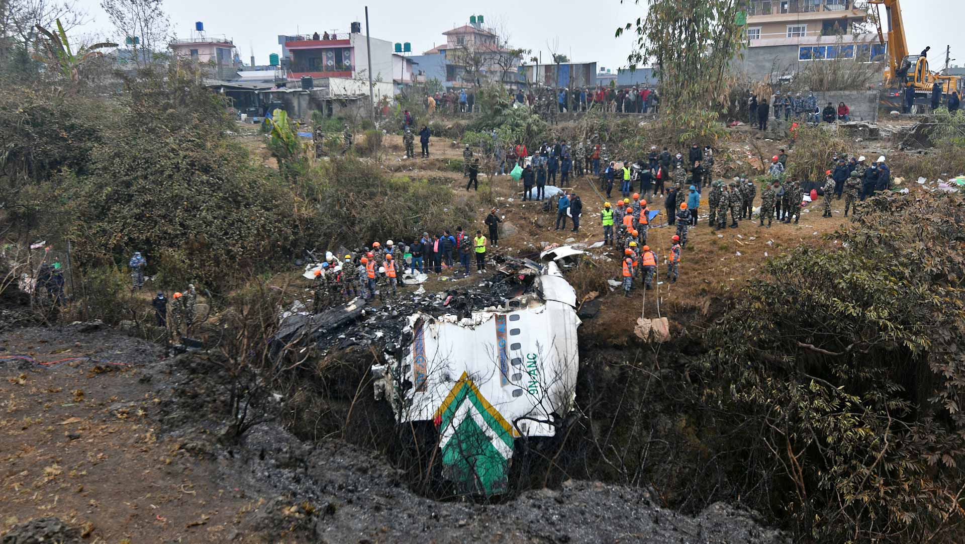 Image for the title: Nepal finds black boxes of aircraft after deadliest crash 