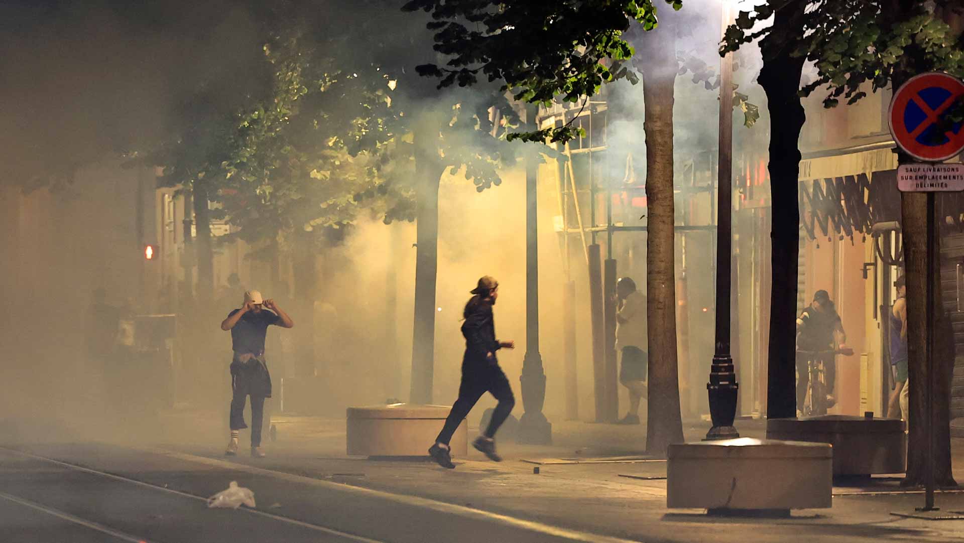 Image for the title: Hundreds more people were detained in France 