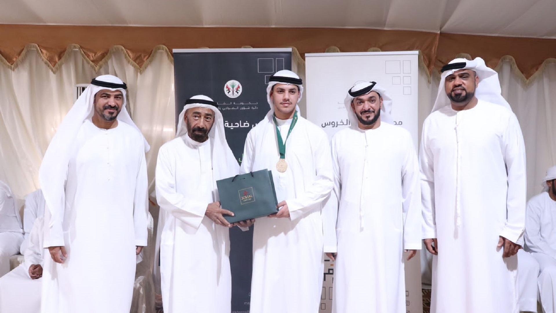 Image for the title: Al Kharous Suburb Council honours high school graduates 