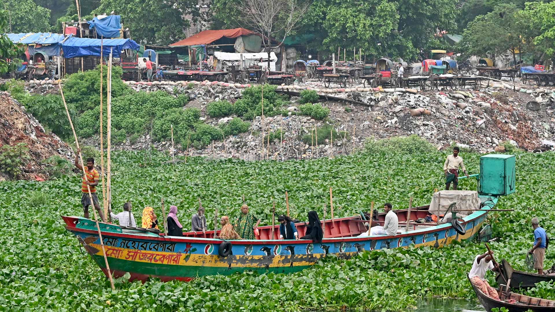 Image for the title: Boat sinks with 20 onboard in Bangladesh's Buriganga river 