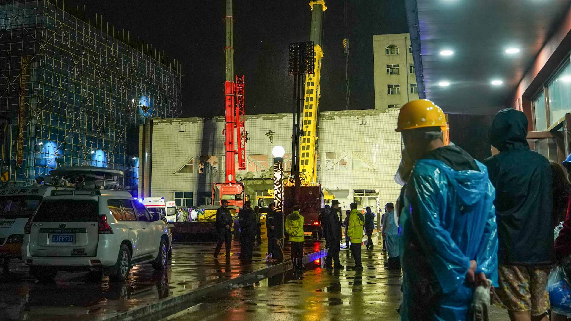 Image for the title: 11 dead after gym roof collapse in China 