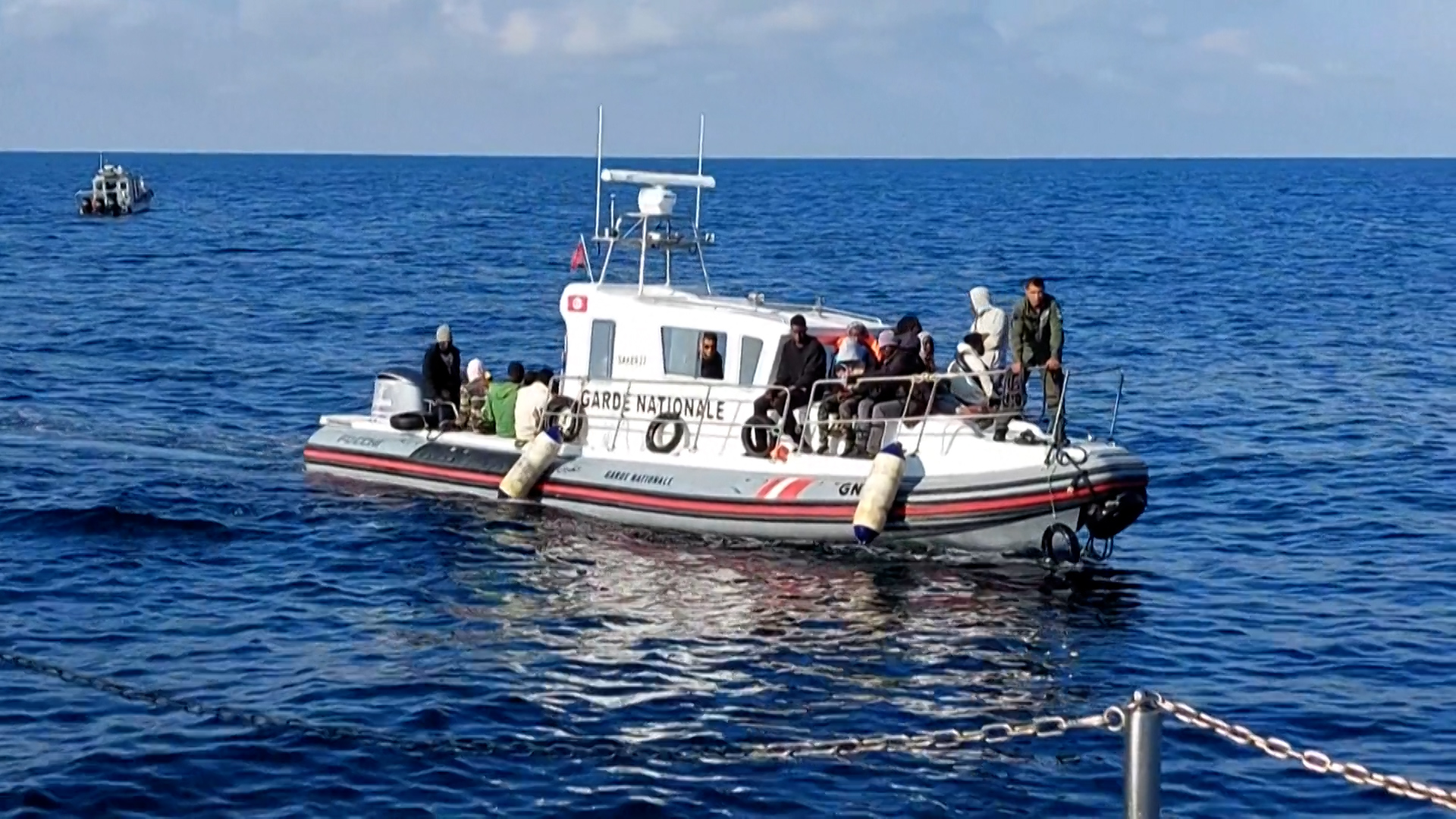 Image for the title: Body of girl found after migrant ships sink: Tunisia coastguard 