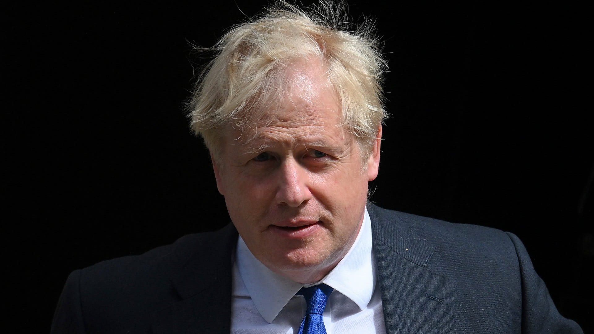 Image for the title: UK MPs approve report censuring ex-PM Johnson over 'Partygate' 