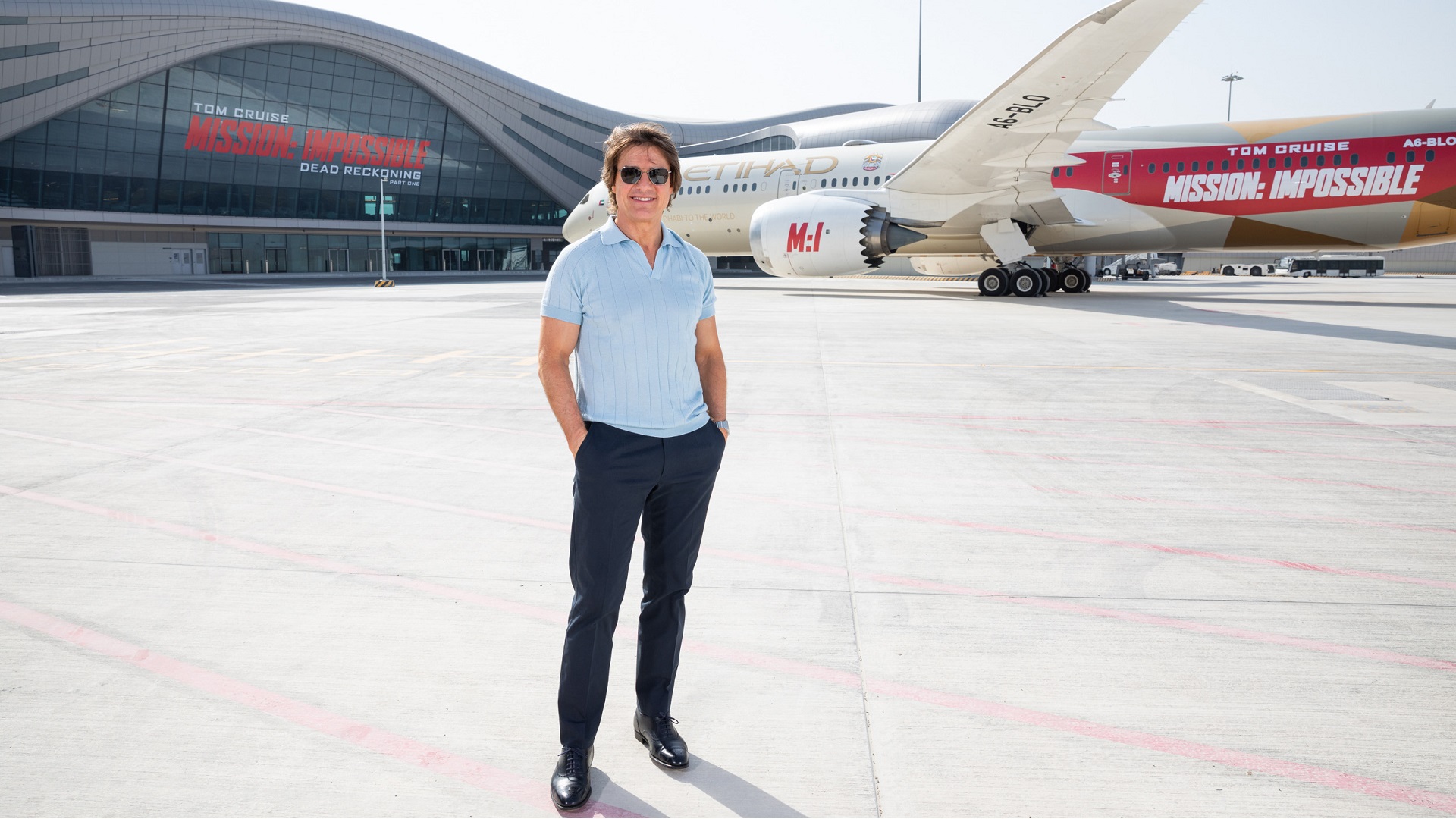 Image for the title: Tom Cruise arrives on first flight into ADIA’s new Midfield TML 