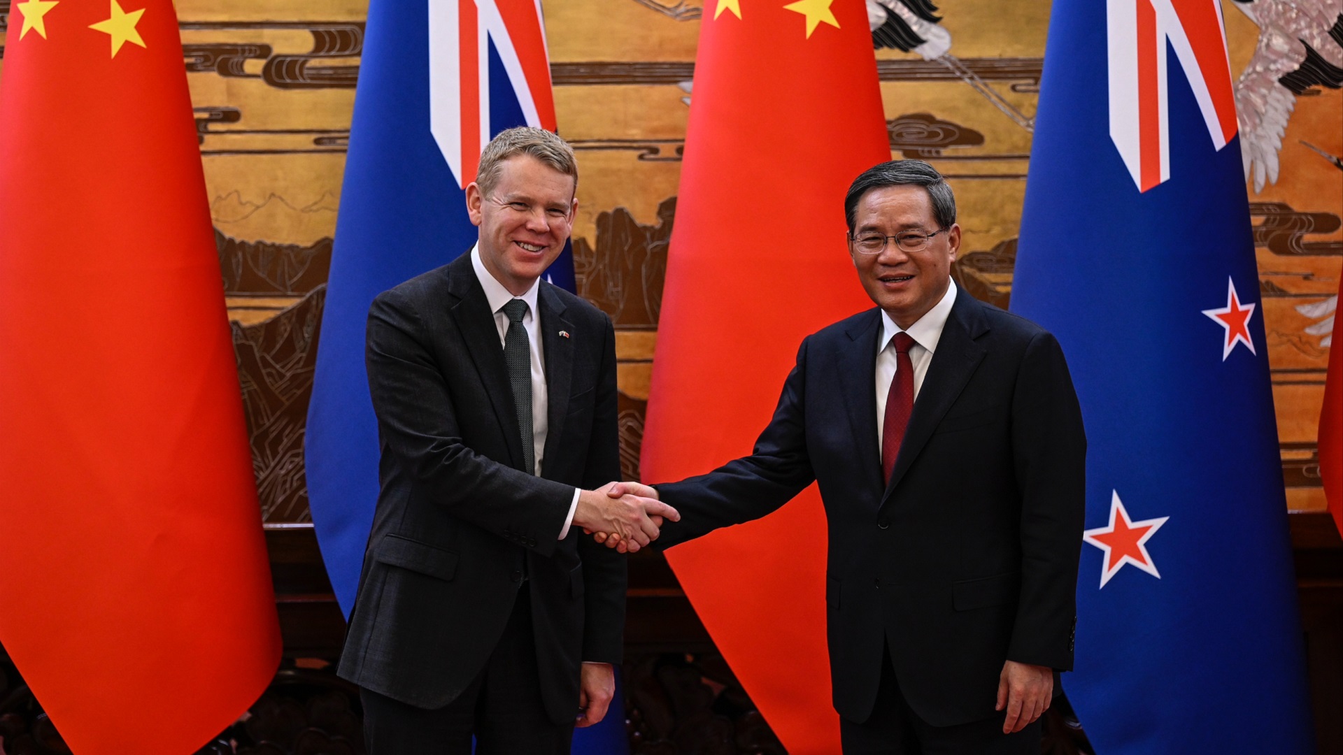 Image for the title: New Zealand PM scores trade deals on China trip 