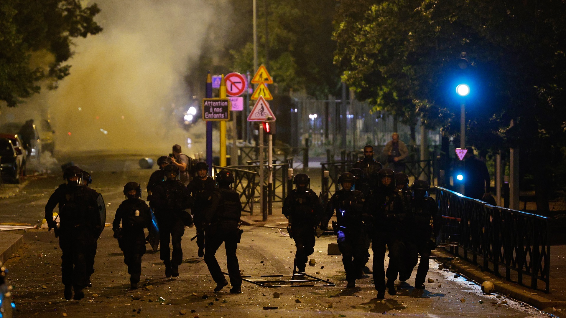 Image for the title: France deploys 45,000 police after riots over teen's death 