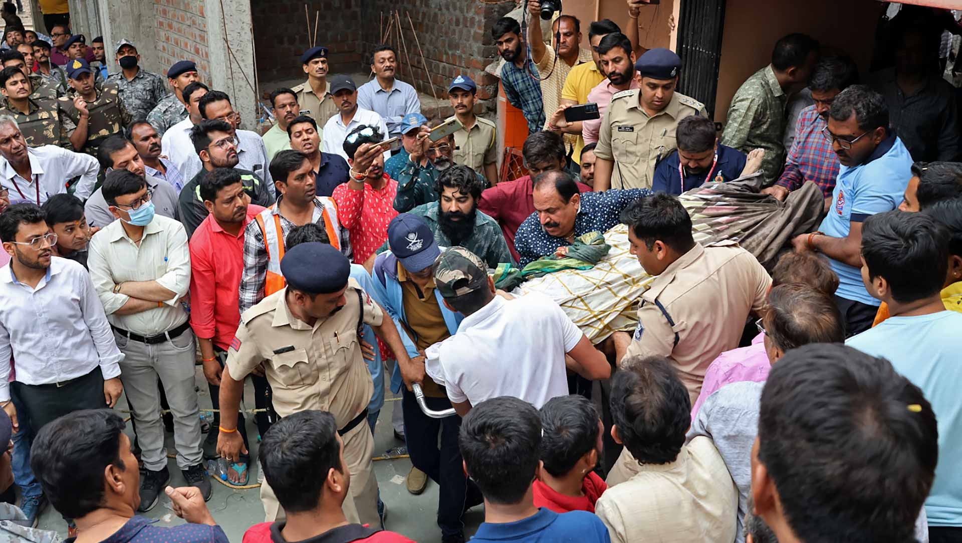 Image for the title: 35 dead, 16 hurt after roof of stepwell collapses in India 