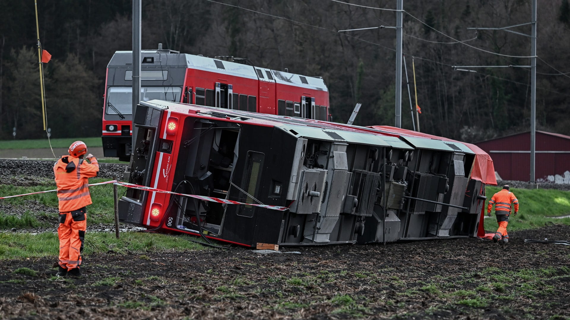 Image for the title: Several hurt as two Swiss trains derail in quick succession 