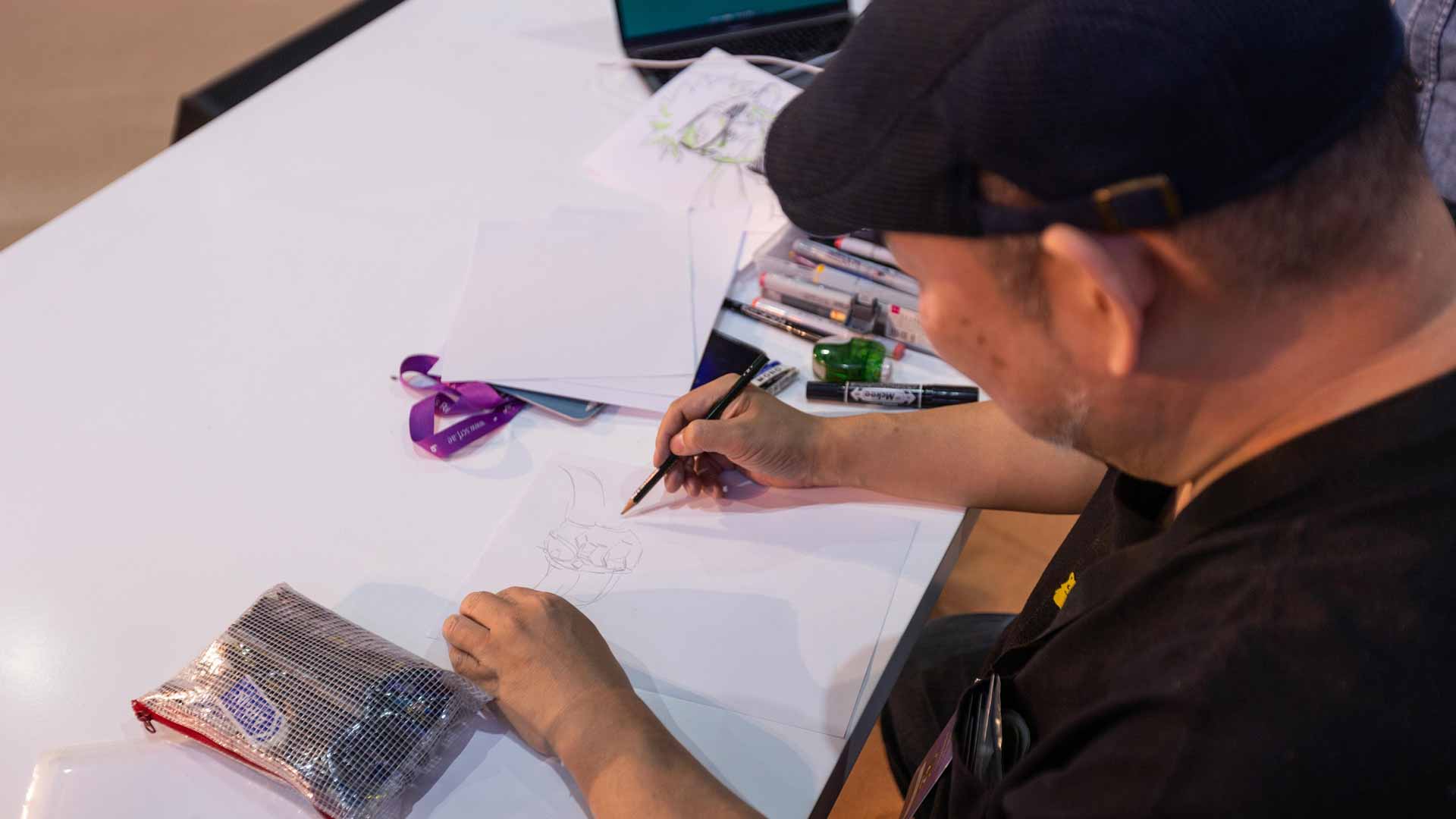 Image for the title: Top artist shows how to create anime-style heroes 