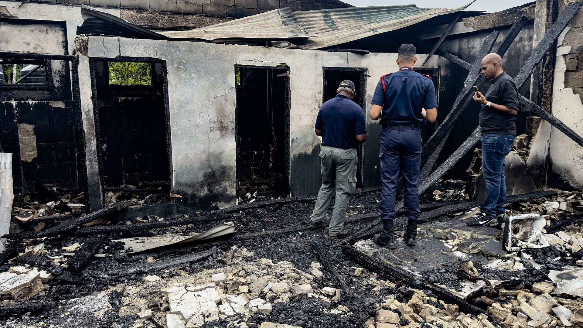 Image for the title: Fire killing 19 in Guyana school may have been set 'maliciously' 