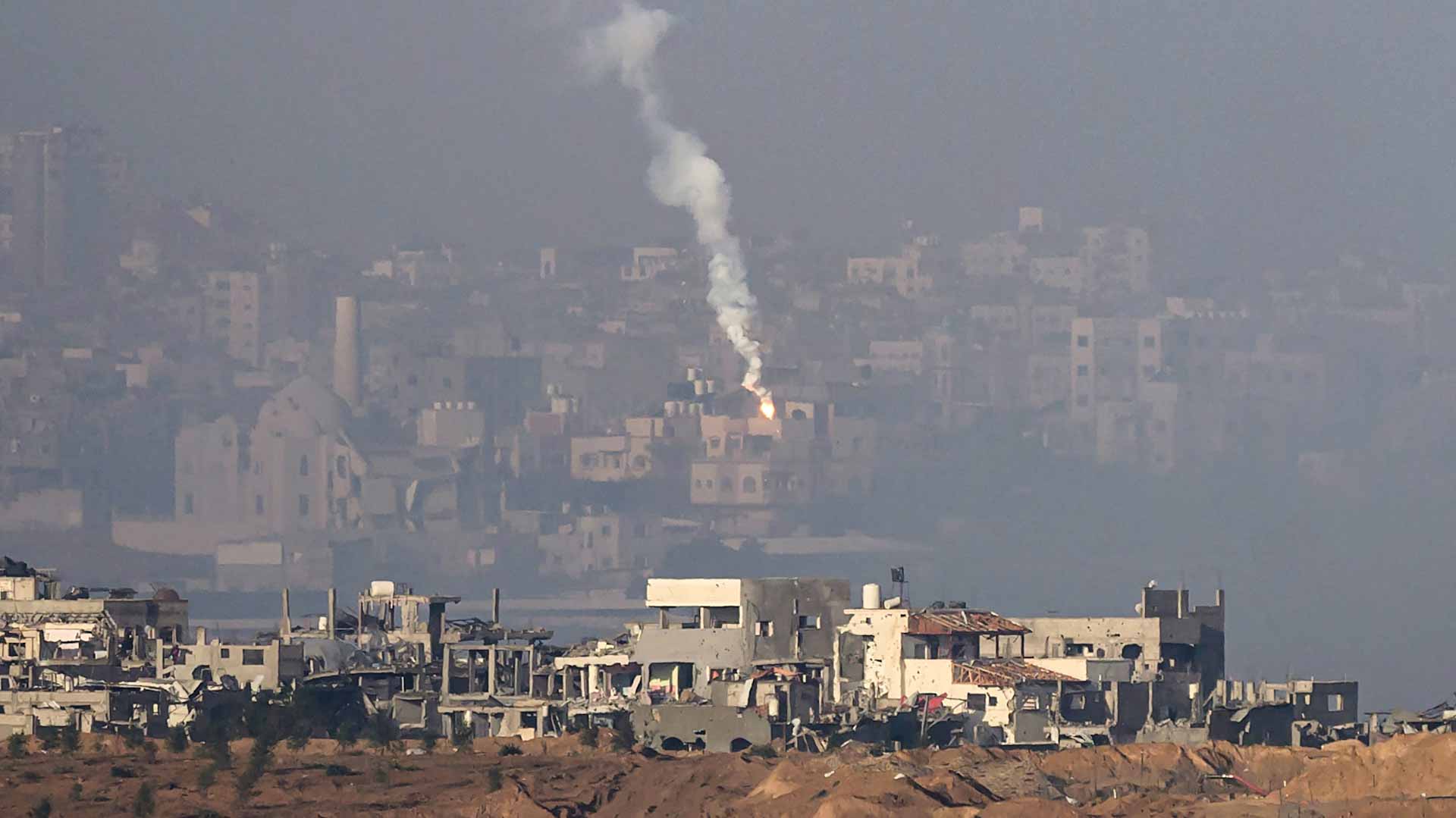 Image for the title: Israel expands Gaza operation as mediator says hostage deal close