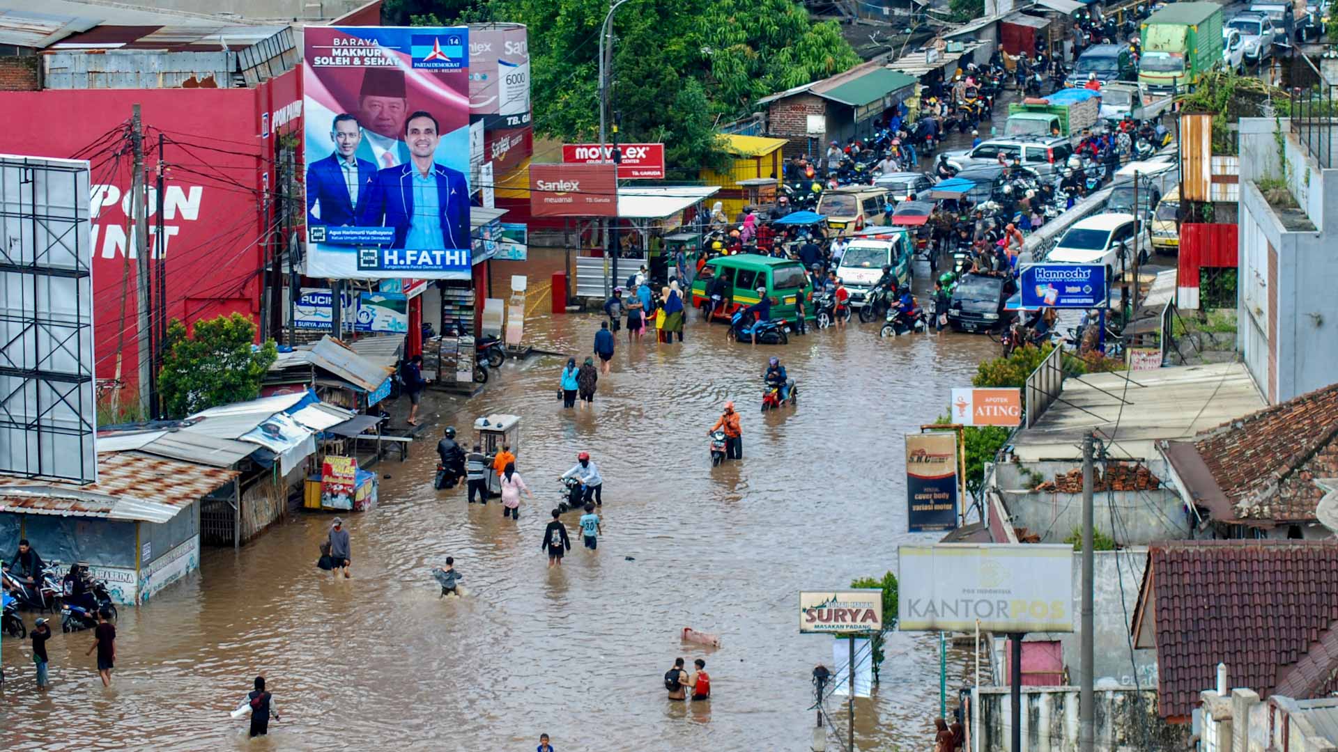 Image for the title: 10 still missing after Indonesia landslide, flash floods