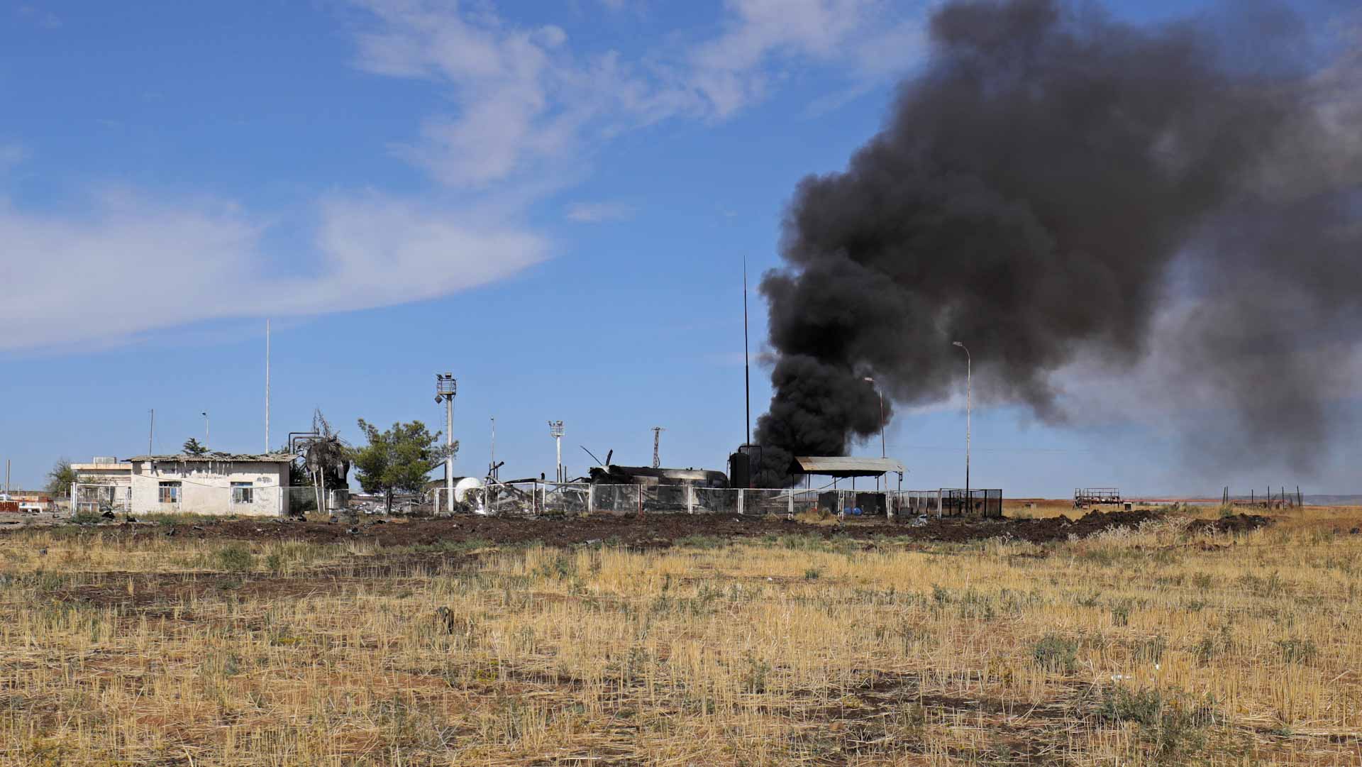 Image for the title: At least 11 killed in Turkish strike on northeast Syria 