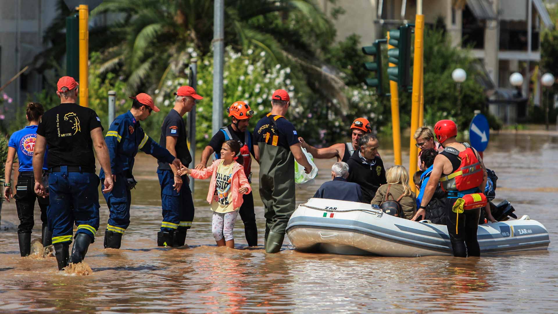 Image for the title: Rescues underway in flood-hit Greek towns as toll rises to 11 