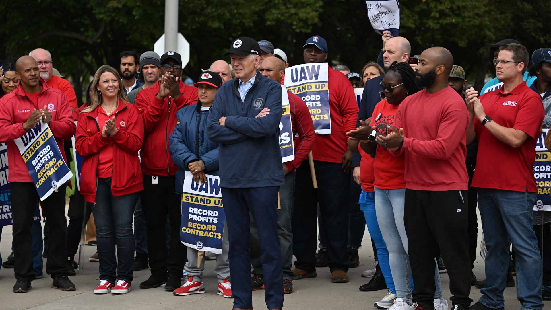 Image for the title: Biden makes history by joining US picket line 