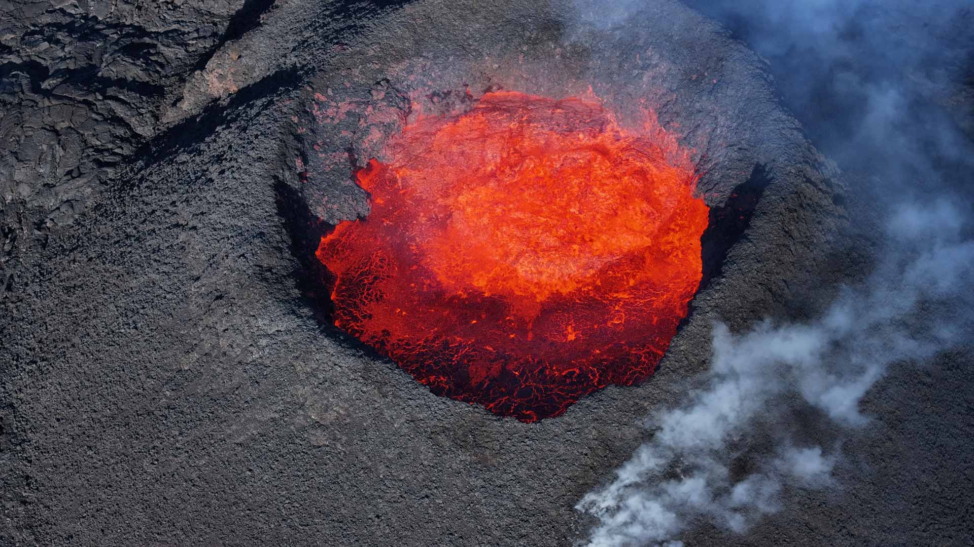 Image for the title: Iceland volcano still spewing lava, one month on 