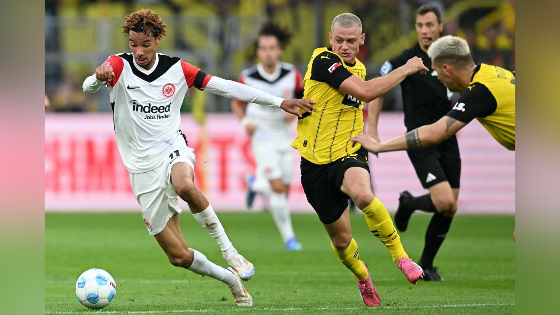 Image for the title: Gittens' double gives Dortmund 2-0 win over Frankfurt  