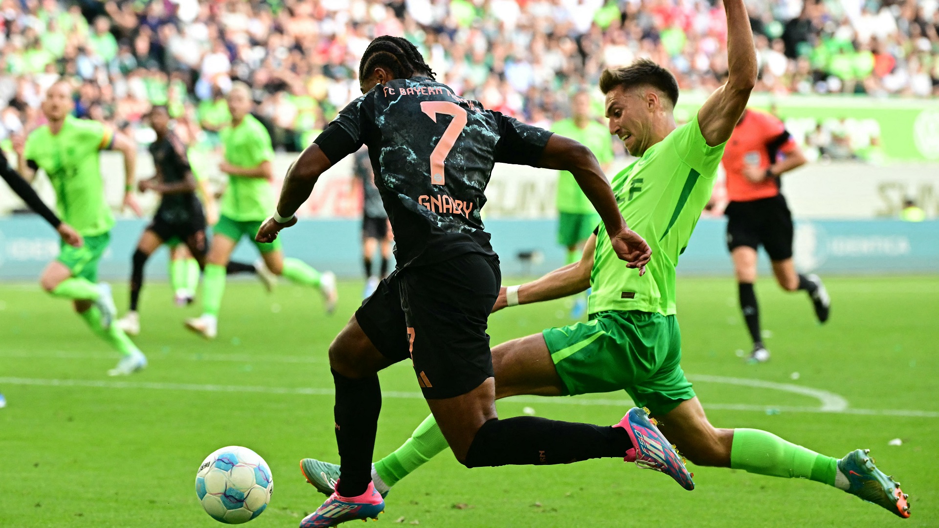 Image for the title: Bayern seals 3-2 win over Wolfsburg in Kompany's Bundesliga debut 