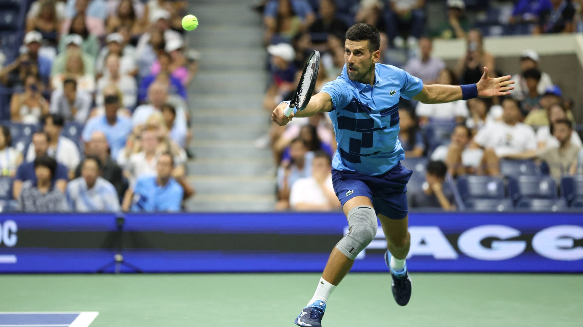 Image for the title: Djokovic shines under the lights 