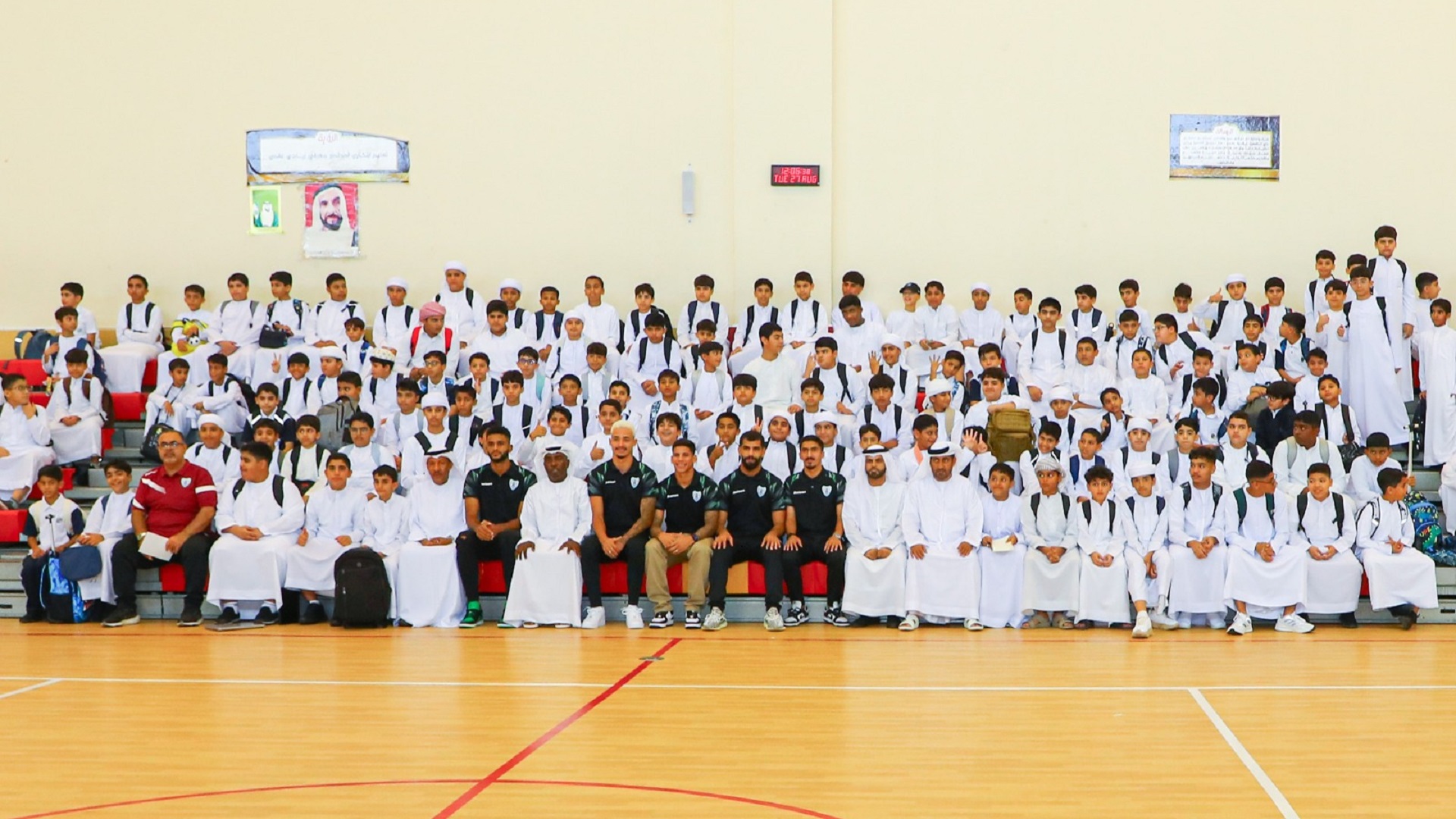 Image for the title: Dibba Al Hisn Club’s first team welcome students back to school 