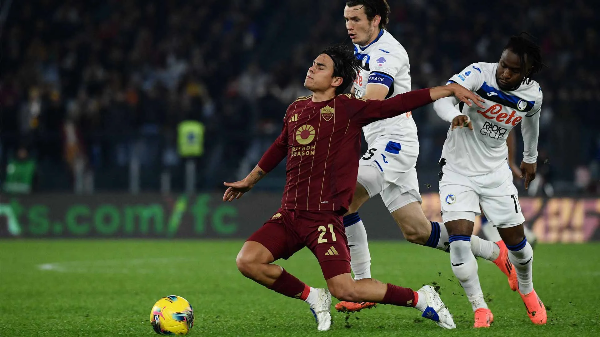 Image for the title: Atalanta surpasses Roma to chase top spot in Italian league 