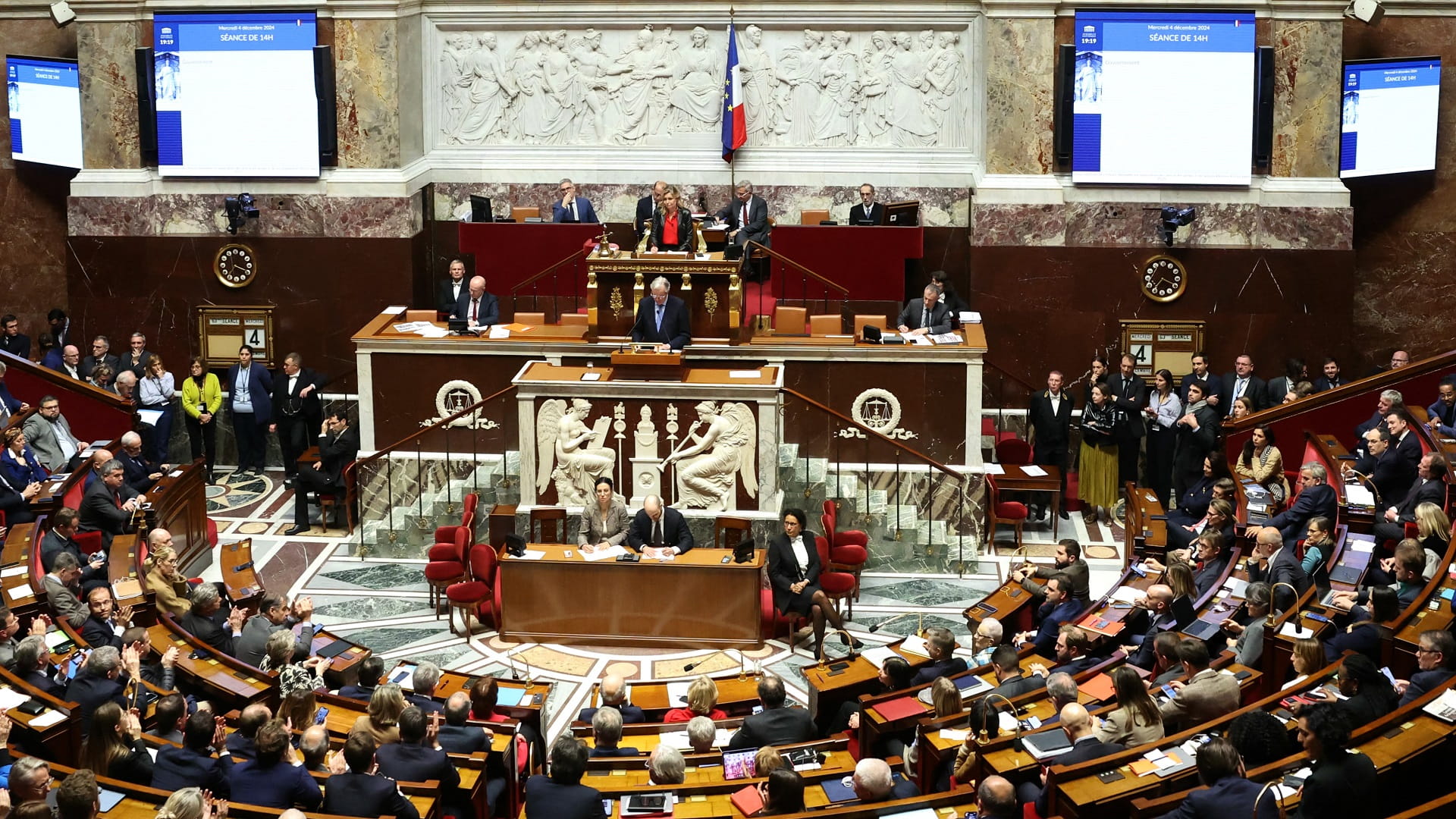 French lawmakers oust government in no-confidence vote 