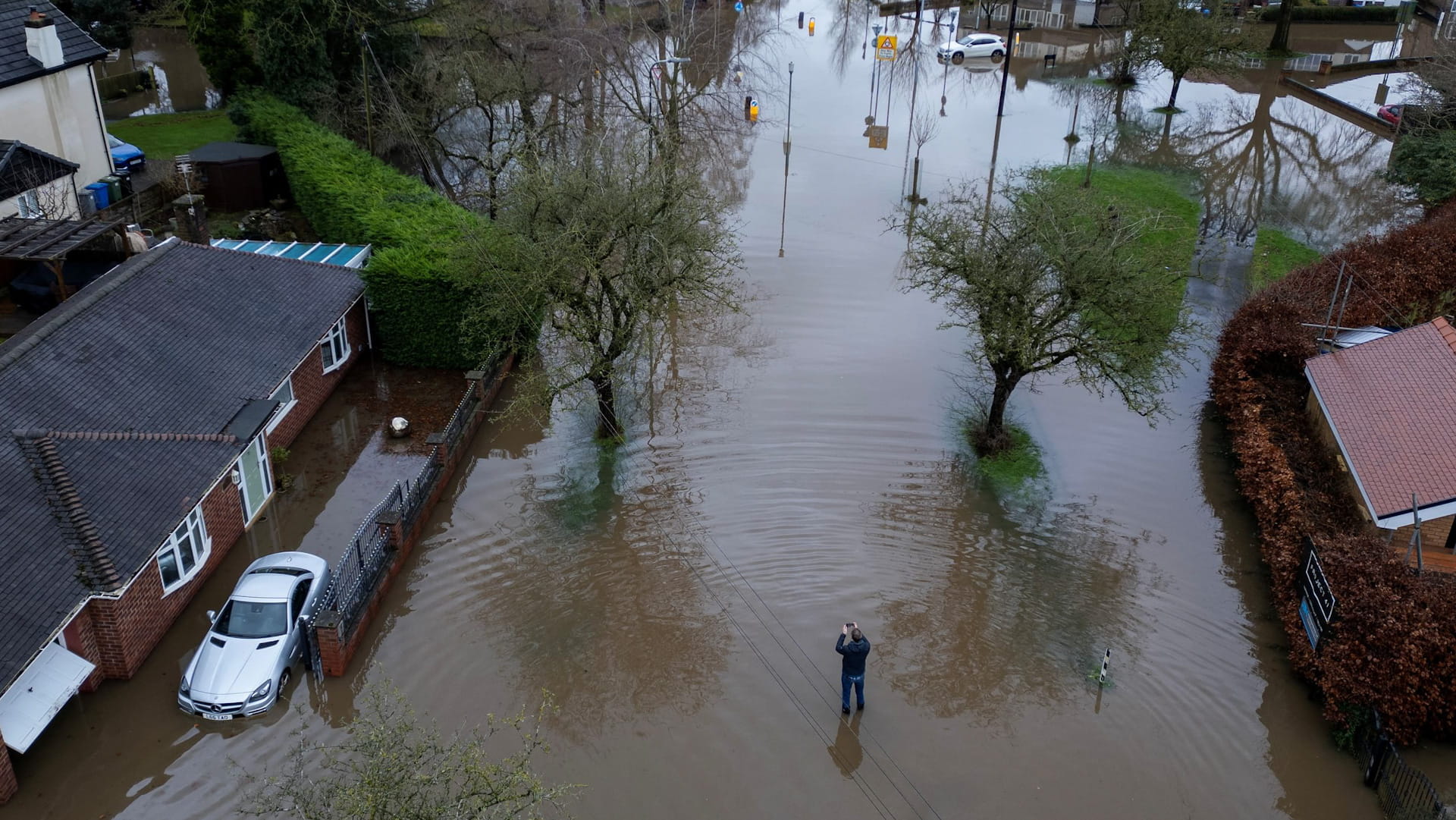 Homes flooded in Greater Manchester as storms hit New Year's Day 