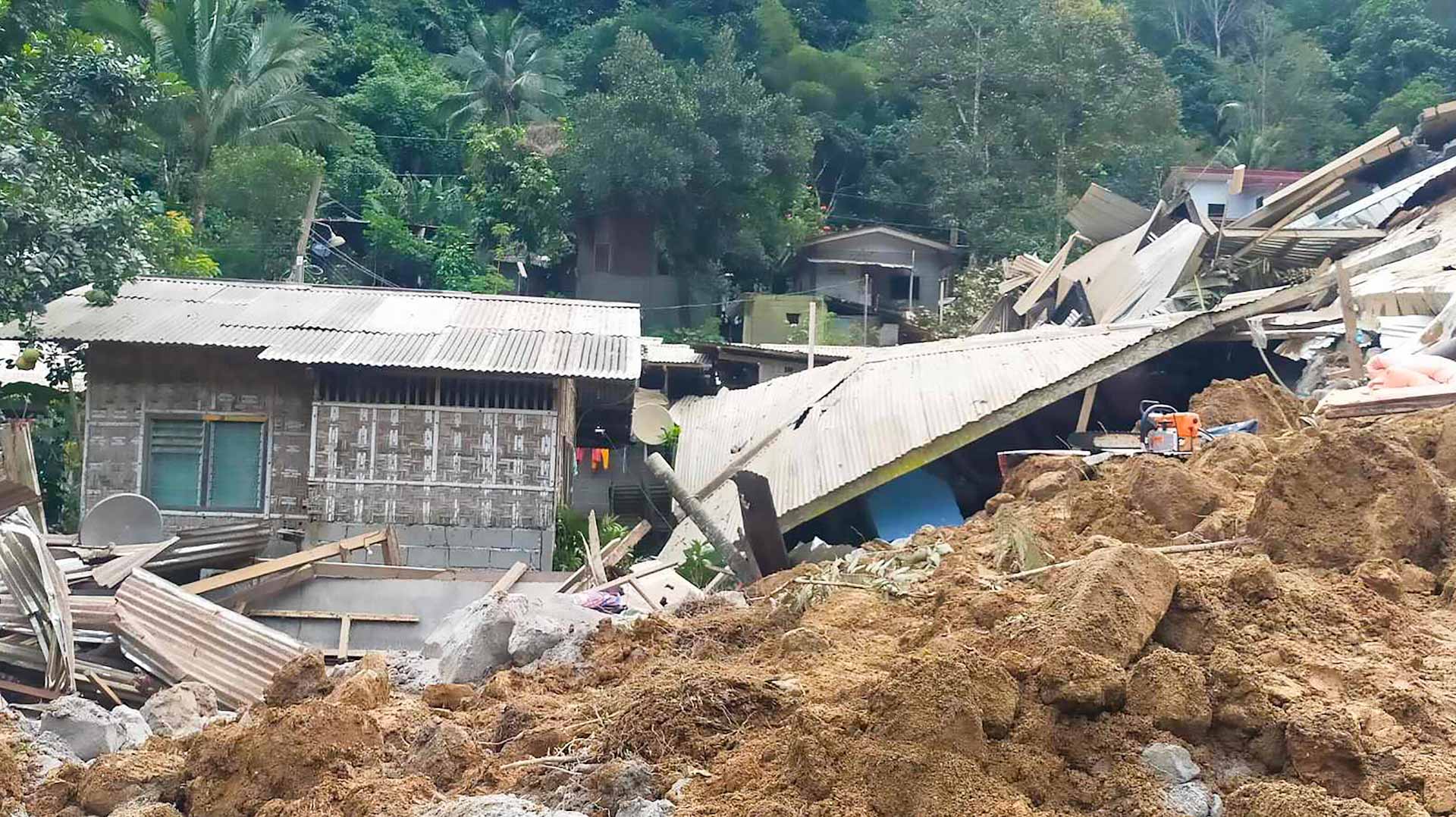 Image for the title: Child rescued nearly 60 hours after Philippine landslide 