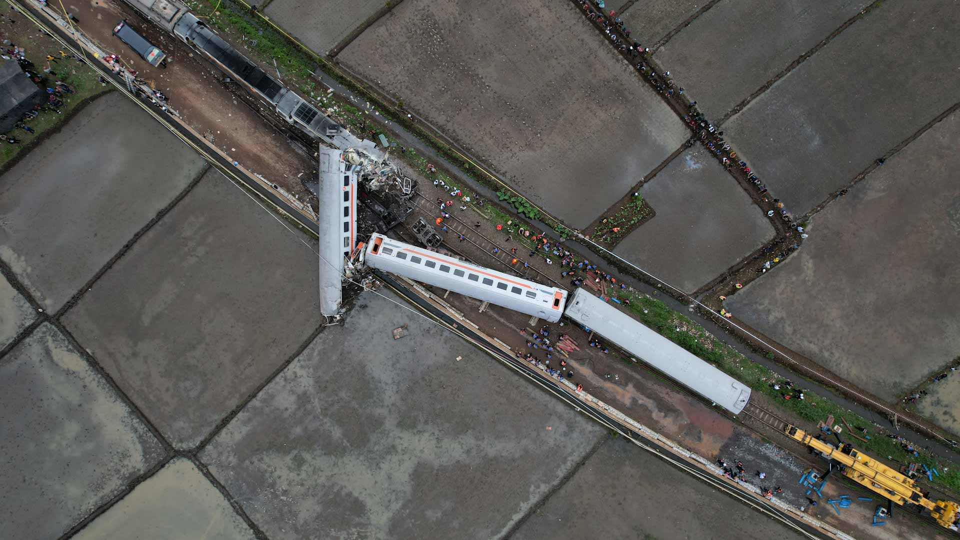 Image for the title: 3 dead, 28 injured in Indonesia train collision 