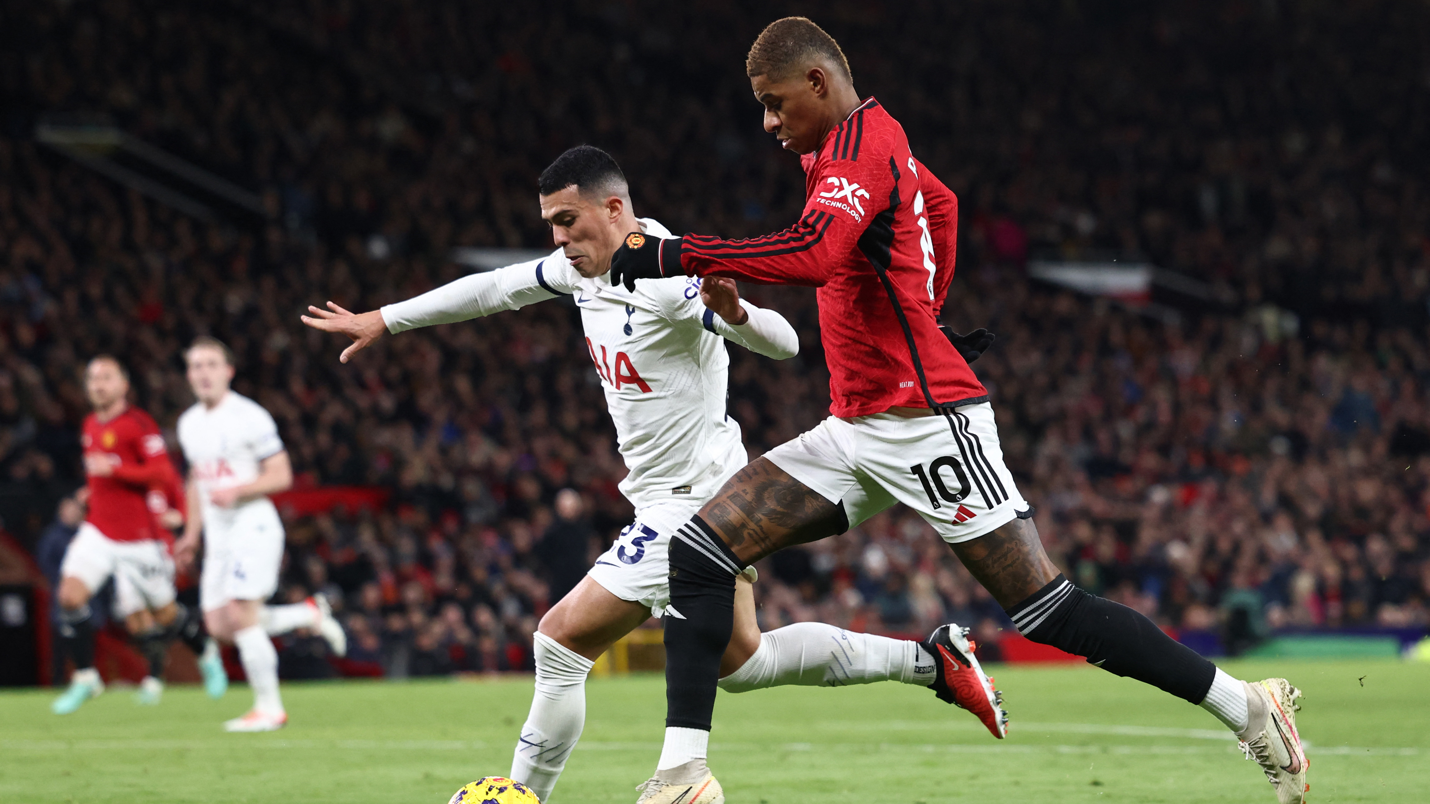 Image for the title: Manchester United looks to gain ground as Tottenham visits 