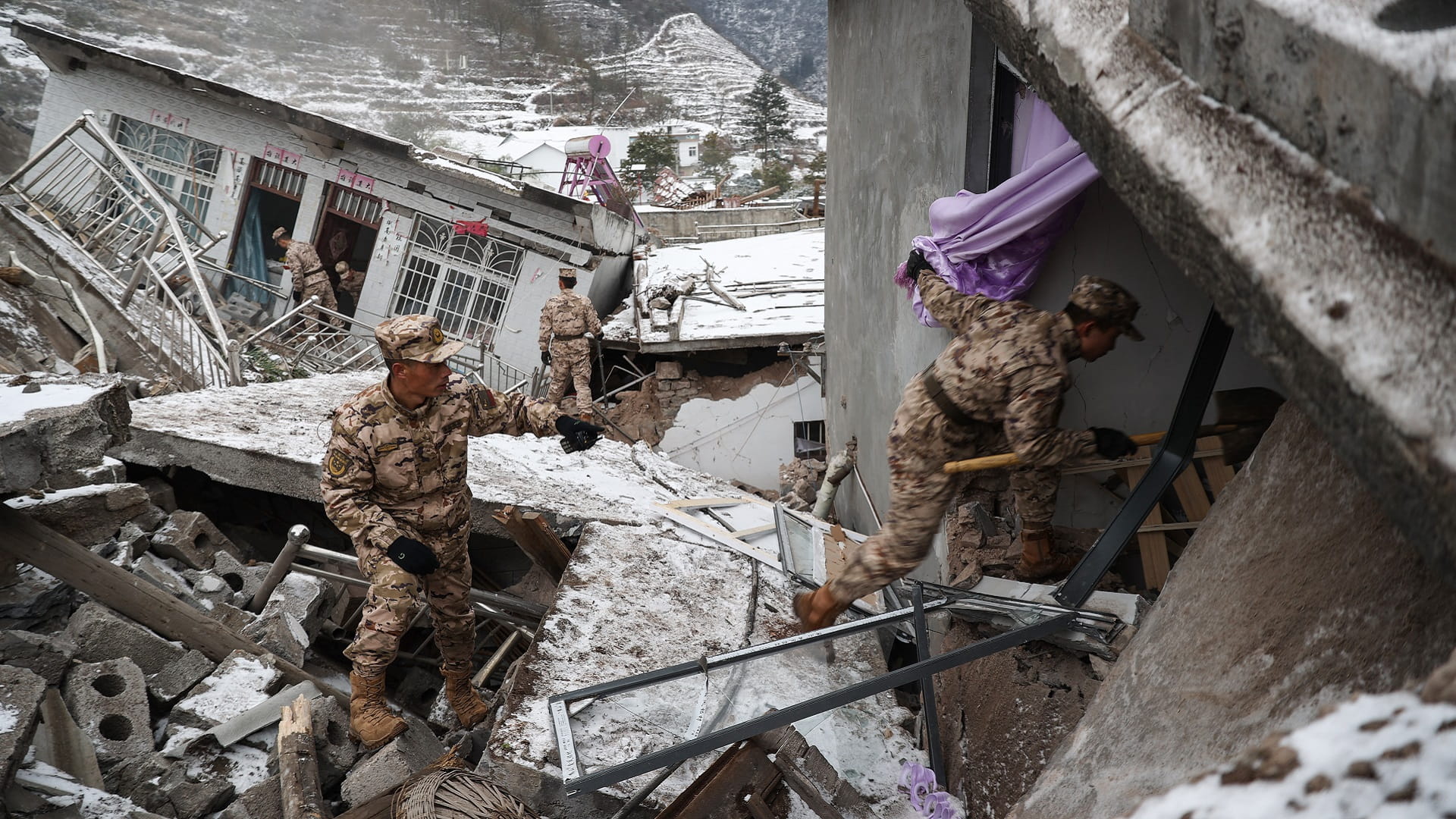 Image for the title: China landslide death toll rises to 44 after final body found 