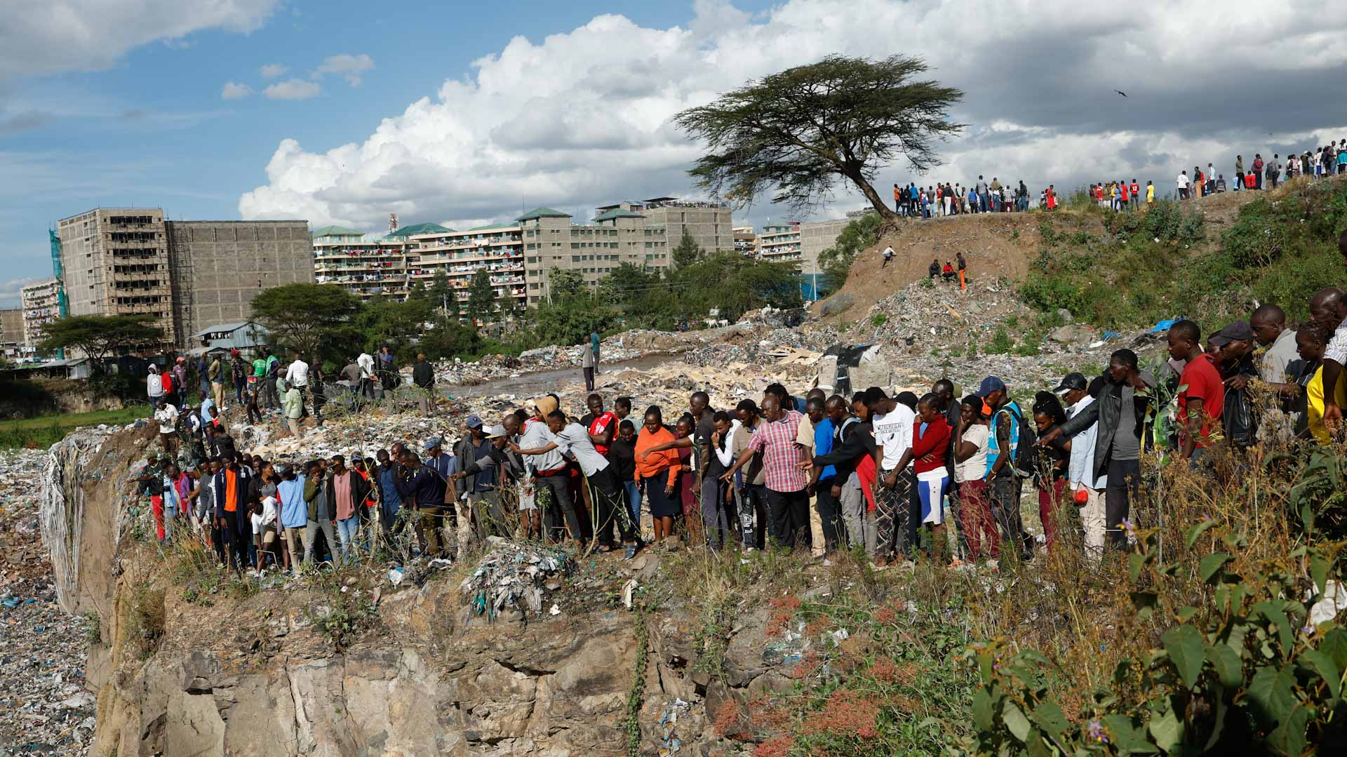Image for the title: Kenya watchdog probes possible police link to dumped bodies 