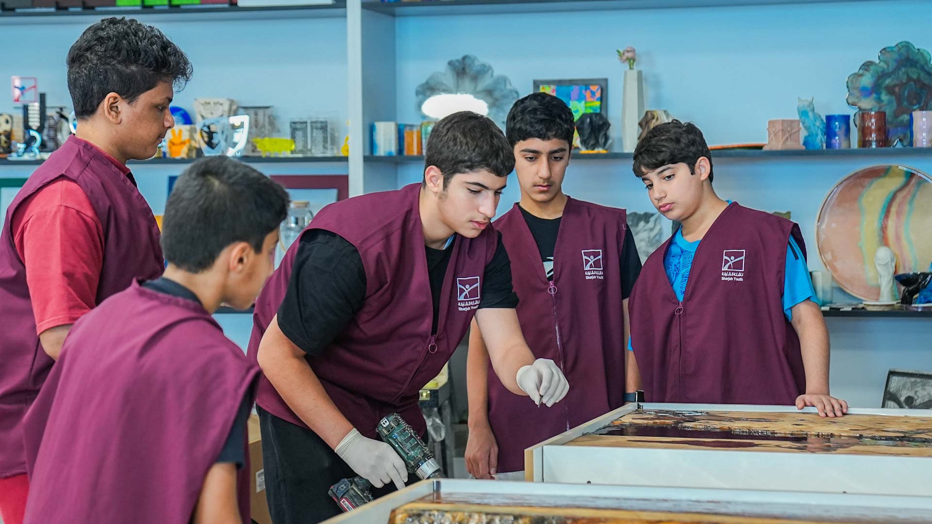 Image for the title: Sharjah Youth’s Creative table-making in skills laboratory 