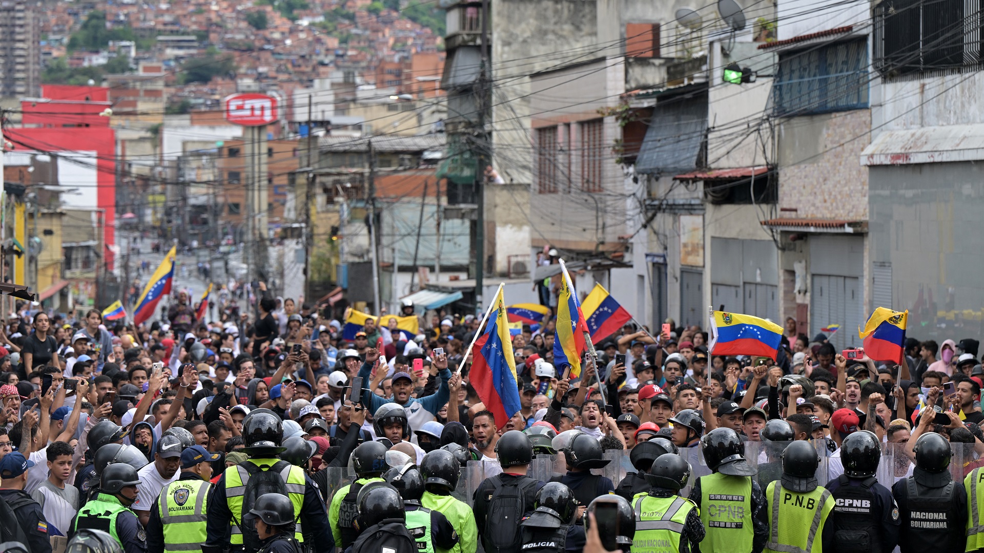 Image for the title: Protests erupt in Caracas over Maduro's disputed re-elction 