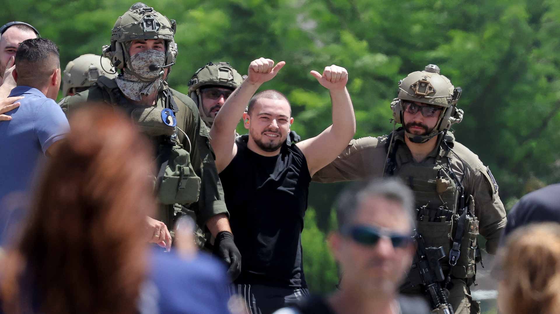 Image for the title: Israel army says rescued 4 Israeli hostages alive in Gaza 