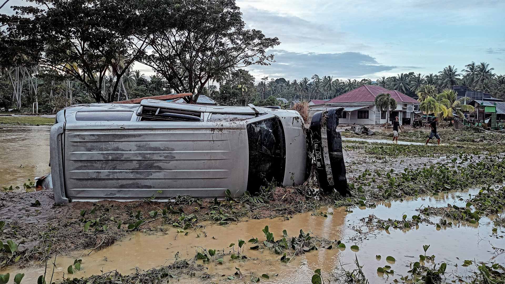 Image for the title: Flood and landslide hit Indonesia’s Sulawesi island, killing 14 