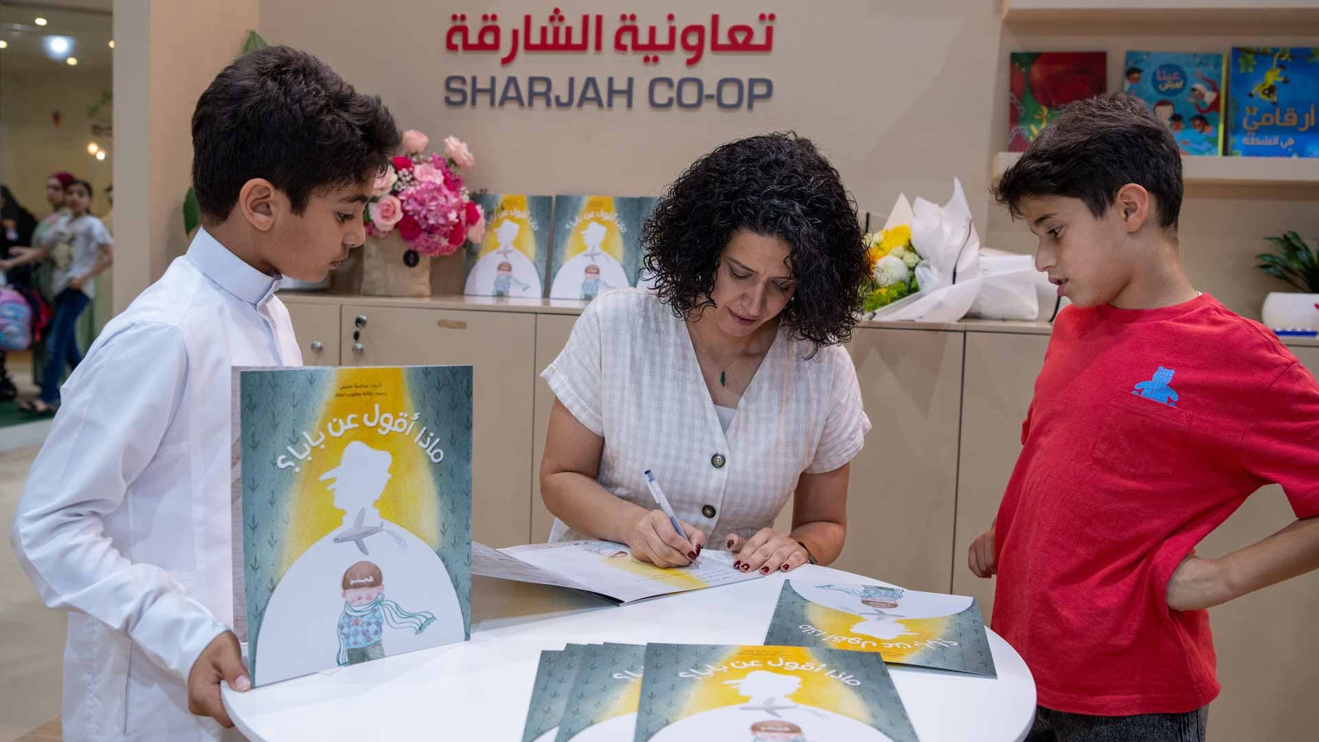 Image for the title: Kalimat pavilion draws crowds with Samia Ayish’s new book 