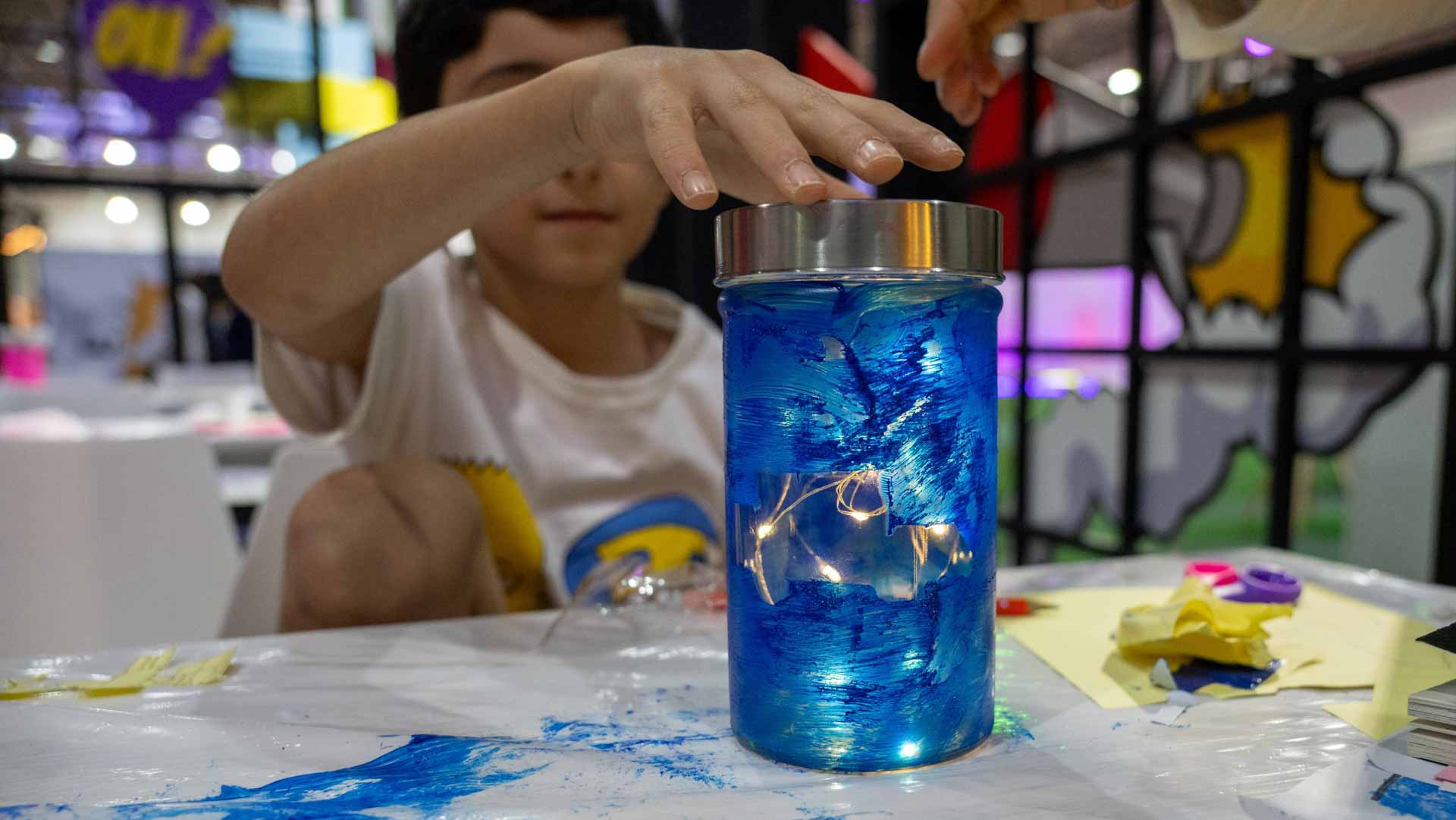 Image for the title: Children expand their artistic potential making lanterns at SCRF 