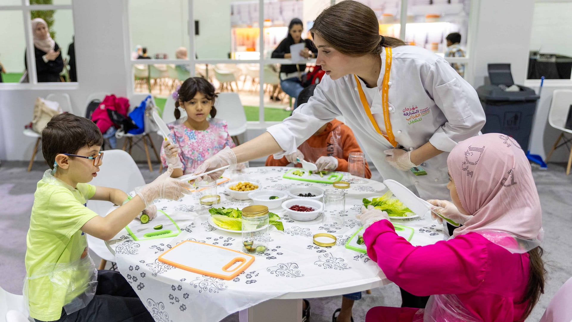 Image for the title: Young chefs learn art of salad making as part of workshop at SCRF 