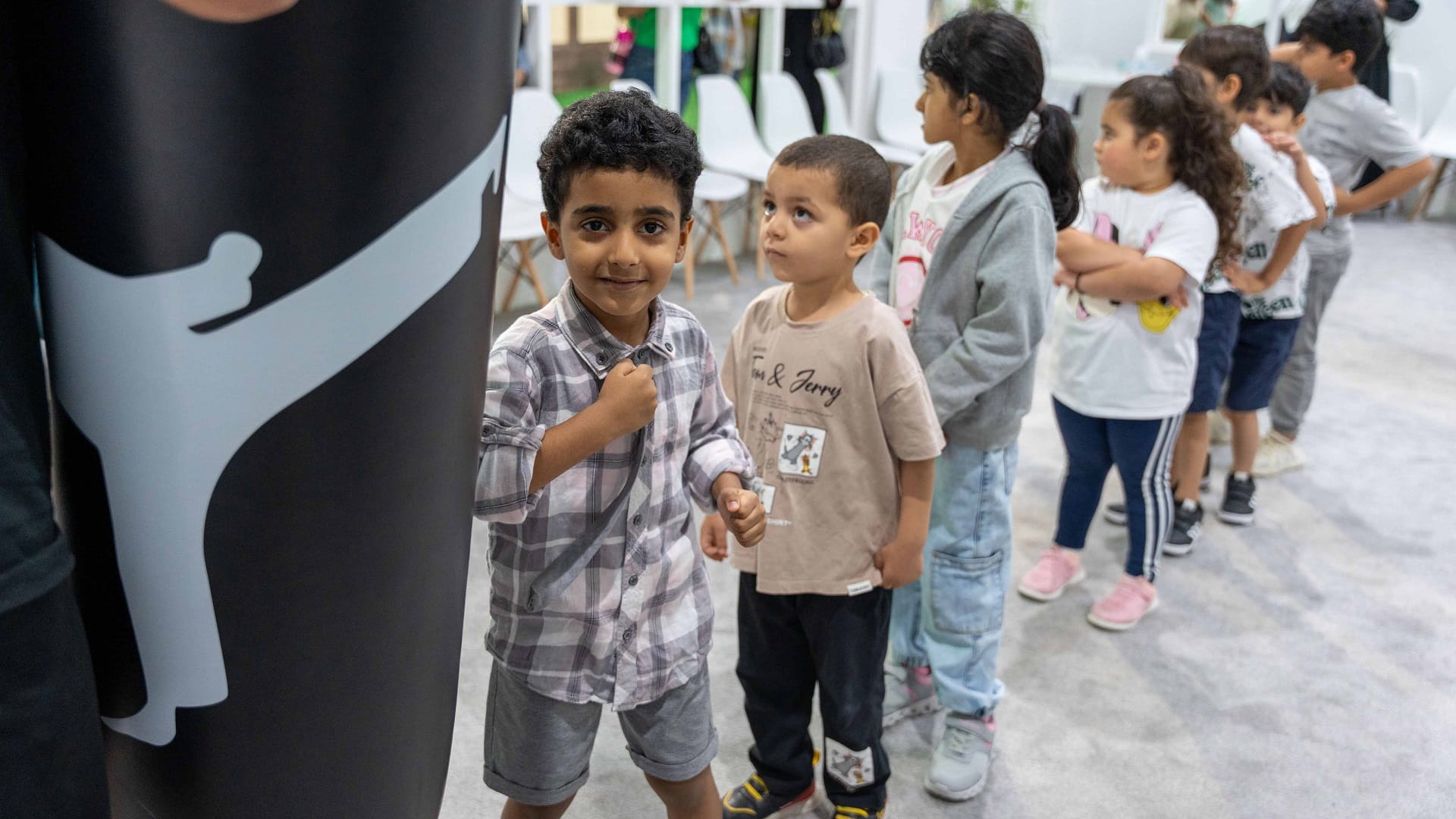 Image for the title: Young visitors get moving at SCRF 2024 with basics of kickboxing 