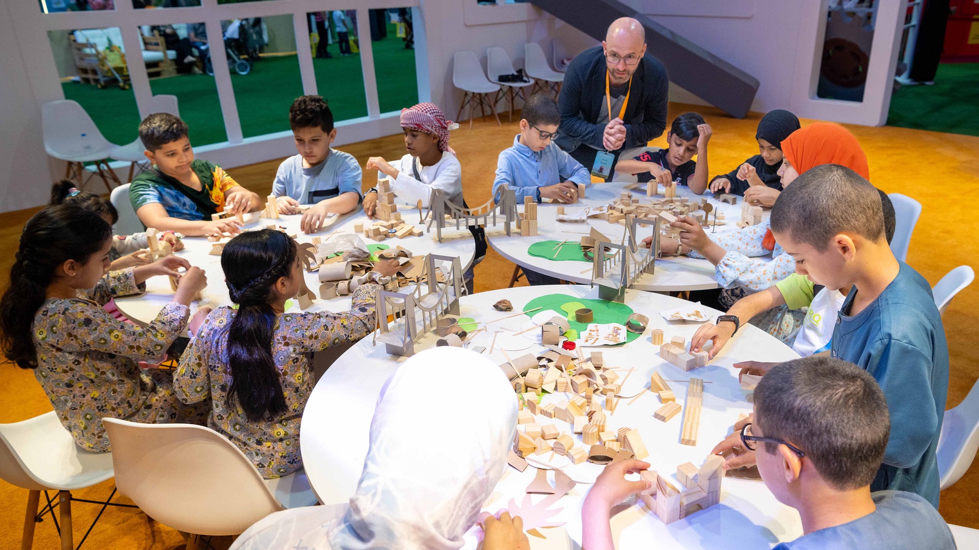 Image for the title: Children enjoy hands-on lesson in green community building at SCRF 