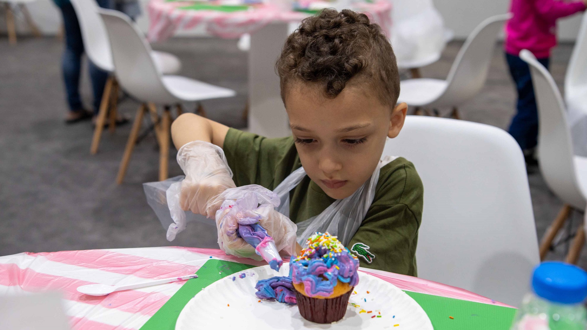 Image for the title: Children design Willy Wonka-inspired sweet treats at SCRF 