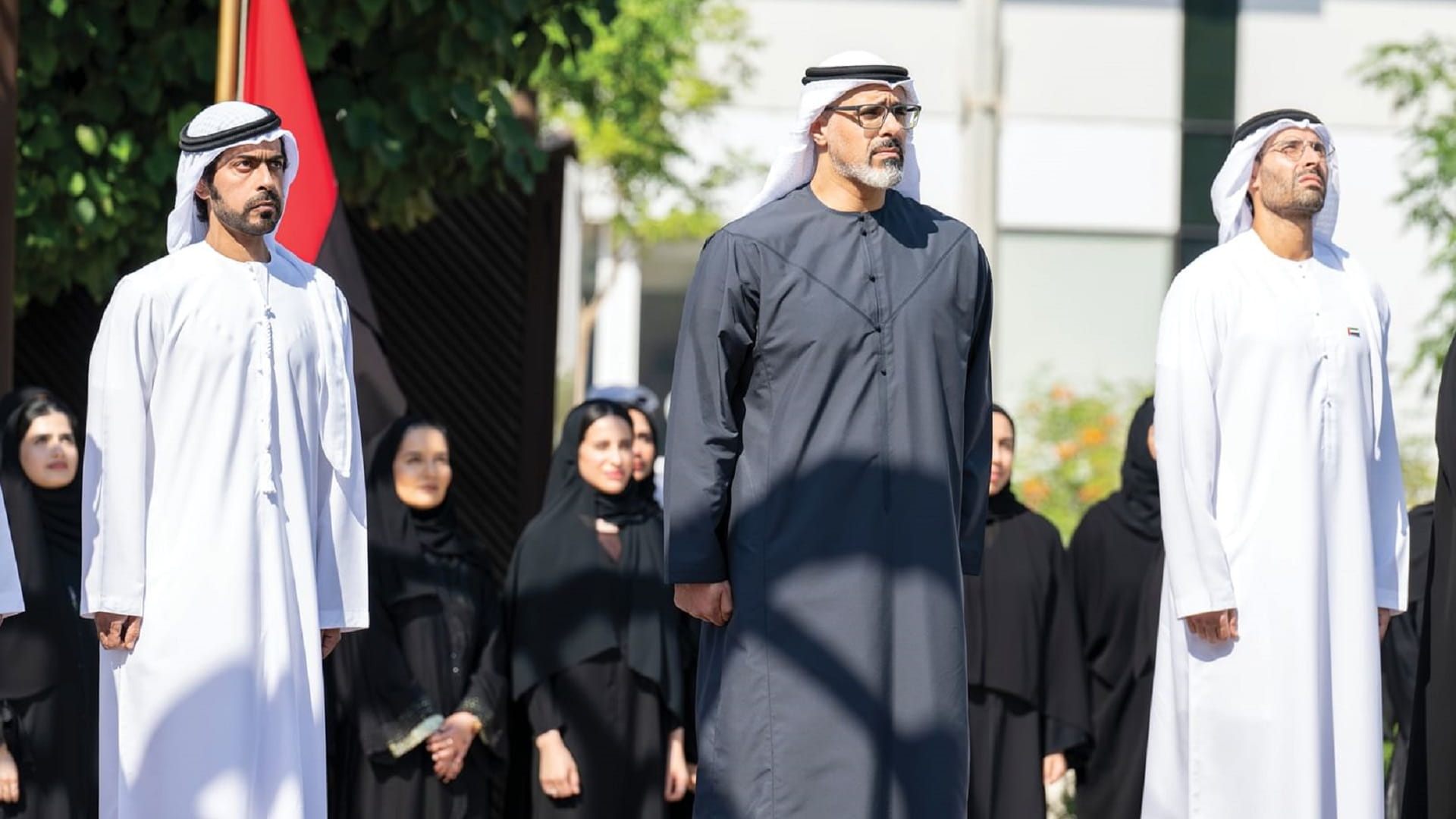 Khaled bin Mohamed raises UAE flag at Abu Dhabi Executive Office 