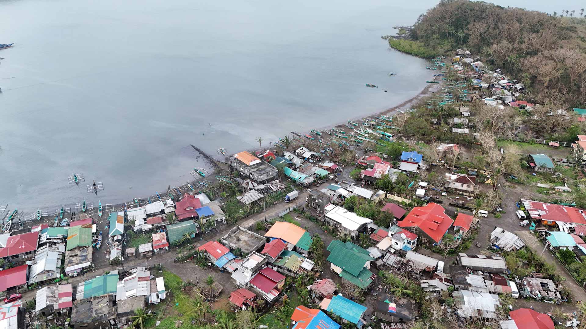 Image for the title: Typhoon Yinxing hits Philippines' north shore, cleanup is underway 